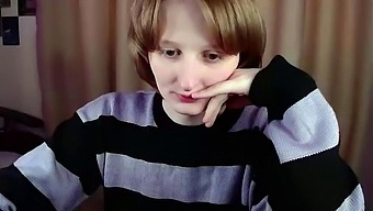 An amateur brunette gets exposed on a webcam and masturbates